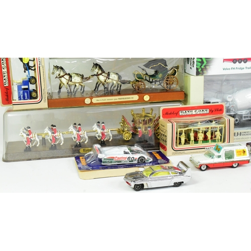 189 - Diecast - a collection of assorted diecast model cars and other vehicles to include; Lledo Days Gone... 