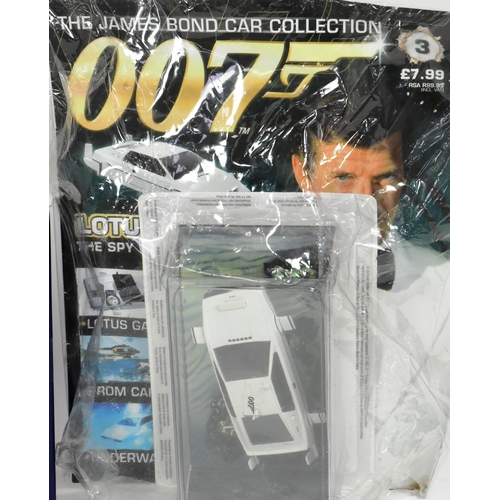 208 - Diecast - a collection of x9 James Bond 007 diecast model cars comprising x7 Corgi examples together... 