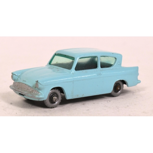 21 - Diecast - a vintage Lesney made Matchbox diecast model No. 7 Ford Anglia. Light blue with black chas... 