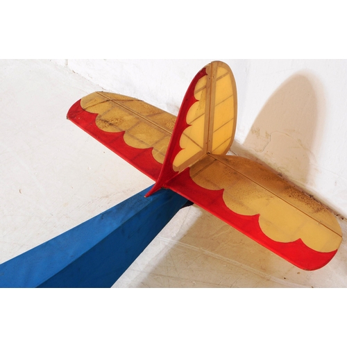 212 - Radio Controlled Plane - a vintage model RC plane fuselage and wings. Wooden construction, in blue, ... 