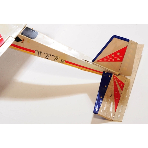 214 - Radio Controlled Plane - a vintage model RC plane fuselage and wings. Wooden construction, with red ... 