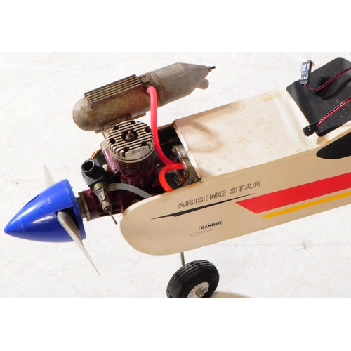 214 - Radio Controlled Plane - a vintage model RC plane fuselage and wings. Wooden construction, with red ... 