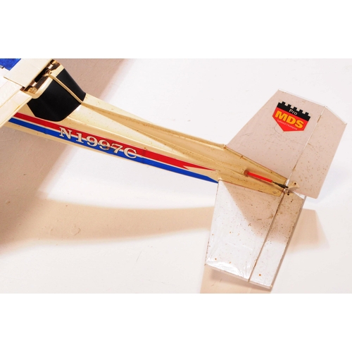 217 - Radio Controlled Plane - a vintage model RC plane fuselage and wings. Fibreglass construction, fitte... 