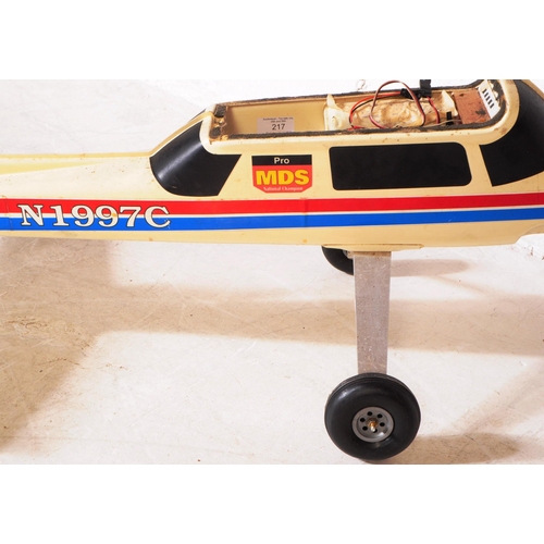 217 - Radio Controlled Plane - a vintage model RC plane fuselage and wings. Fibreglass construction, fitte... 