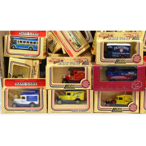 219 - Diecast - a large collection of vintage Lledo Days Gone, Corgi and Dinky diecast model cars and othe... 