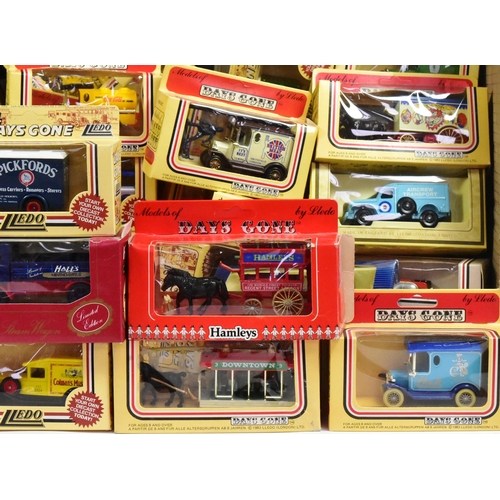 219 - Diecast - a large collection of vintage Lledo Days Gone, Corgi and Dinky diecast model cars and othe... 