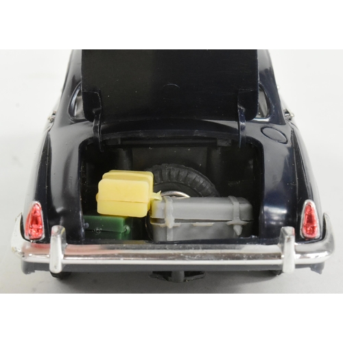 22 - A vintage Empire Made (Telsalda) Jaguar Mark 10 Saloon friction motor model car. Detailed model with... 