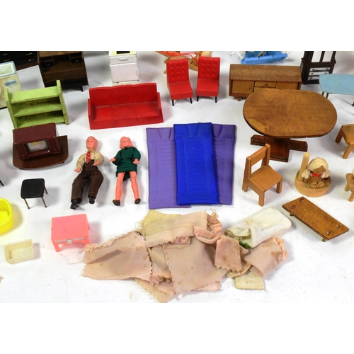 220 - Doll's House Furniture - a large quantity of assorted scale vintage Dolls House furniture. Various d... 