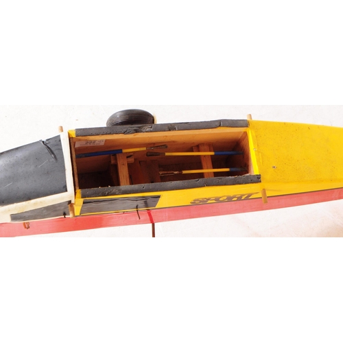 222 - Radio Controlled Plane - a vintage model RC plane fuselage and wings. Wooden construction, in red an... 