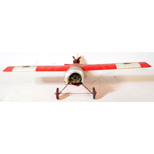 273 - Radio Controlled Plane - a vintage model RC plane fuselage and wings. Wooden construction, painted r... 