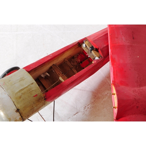 273 - Radio Controlled Plane - a vintage model RC plane fuselage and wings. Wooden construction, painted r... 