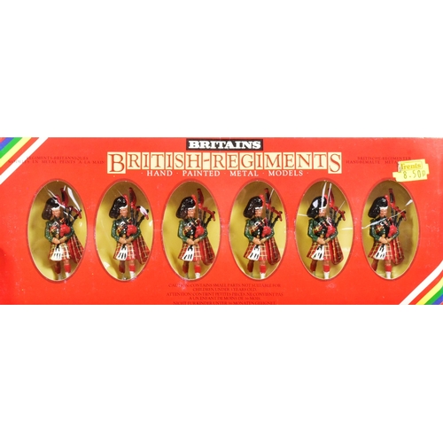 282 - Toy Soldiers - a collection of x4 Britains made hand painted metal toy soldiers comprising; Trooping... 