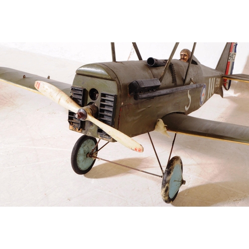 299 - Radio Controlled Plane - a vintage model RC plane fuselage and wings. Fitted with front propellers a... 