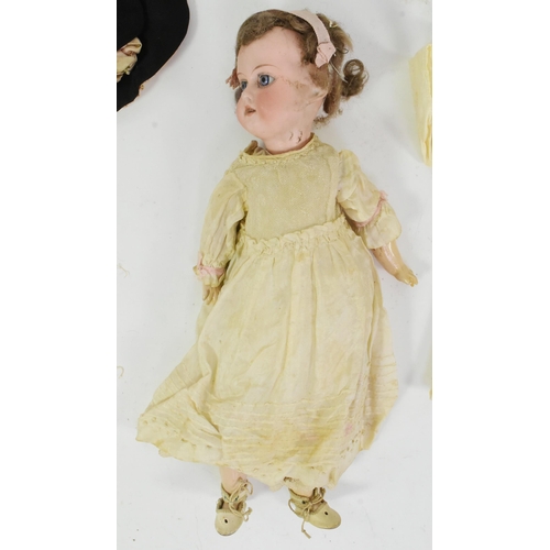 318 - An early 20th Century German Armand Marseille bisque headed doll. Blue fixed eyes, finely painted br... 