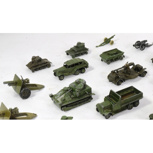 320 - Diecast - a collection of vintage Dinky Toys diecast models of Military interest to include armoured... 