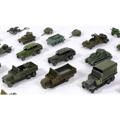 320 - Diecast - a collection of vintage Dinky Toys diecast models of Military interest to include armoured... 