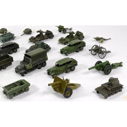 320 - Diecast - a collection of vintage Dinky Toys diecast models of Military interest to include armoured... 