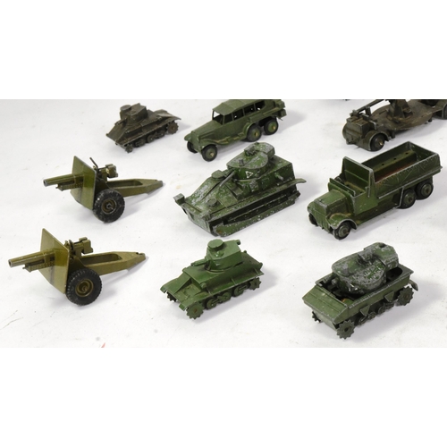 320 - Diecast - a collection of vintage Dinky Toys diecast models of Military interest to include armoured... 