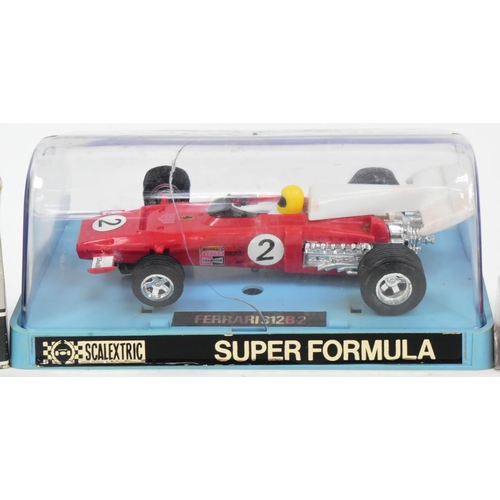 323 - Two vintage Scalextric slot car racing cars comprising Super Formula Ferrari 312B2 and Wolf WR5 Red ... 