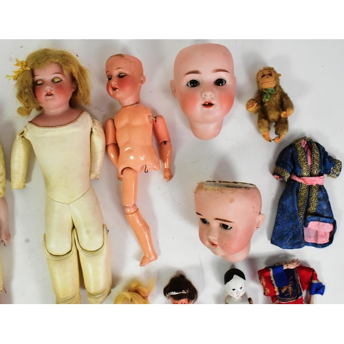 330 - Dolls - a collection of assorted German and French bisque headed dolls, parts / spares repairs to in... 