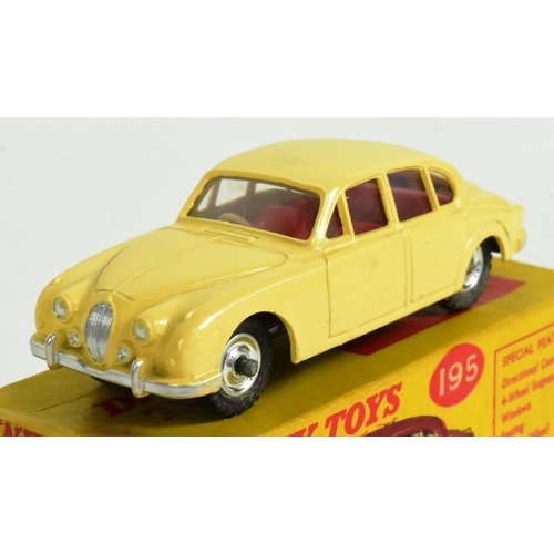 346 - Diecast - an original vintage Dinky Toys boxed diecast model No. 195 Jaguar 3.4 Saloon. Cream with r... 