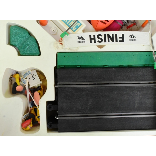 375 - Scalextric - a vintage Triang Scalextric ' You Steer ' slot car racing set No. YS300. The set contai... 