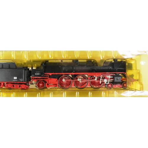 68 - Model Railway - a vintage Marklin OO gauge trainset locomotive and tender, no. 8397 BR 03 fur Zweile... 