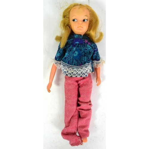 409 - Barbie - Mattel - an original vintage 1960s Barbie doll with blonde hair, stamped to the body 'Midge... 