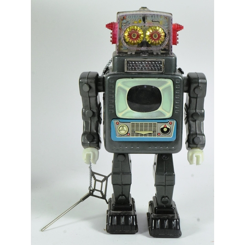 410 - Tinplate Toys - a vintage Japanese (Alps) tinplate battery operated Television Spaceman robot. Untes... 