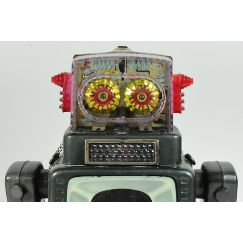 410 - Tinplate Toys - a vintage Japanese (Alps) tinplate battery operated Television Spaceman robot. Untes... 