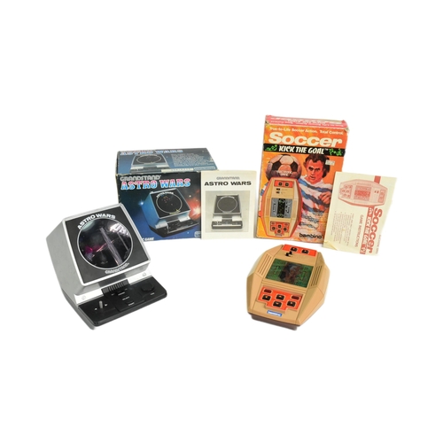 426 - Retro Gaming - x2 vintage tabletop / hand held video game consoles comprising Grandstand Astro Wars ... 