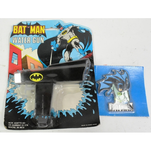 439 - Batman & Superman - a collection of vintage Superman and Batman movie merchandise comprising; Topps ... 