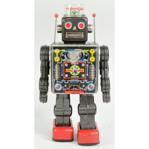 445 - Tinplate Toys - a vintage Japanese (Horikawa) tinplate battery operated Fighting Robot. Moving arms,... 