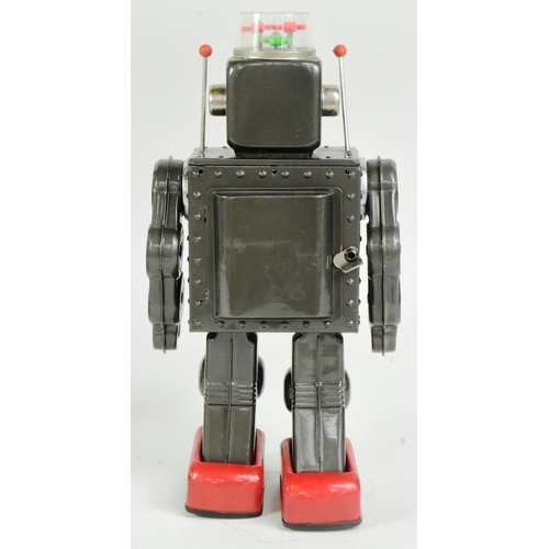 445 - Tinplate Toys - a vintage Japanese (Horikawa) tinplate battery operated Fighting Robot. Moving arms,... 