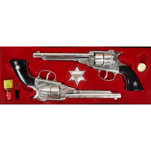 449 - A vintage 1960s BCM Company (Derby) ' Outlaw Guns ' Apache calibre .44 replica toy guns. The set con... 