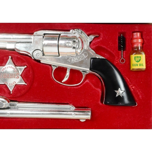 449 - A vintage 1960s BCM Company (Derby) ' Outlaw Guns ' Apache calibre .44 replica toy guns. The set con... 