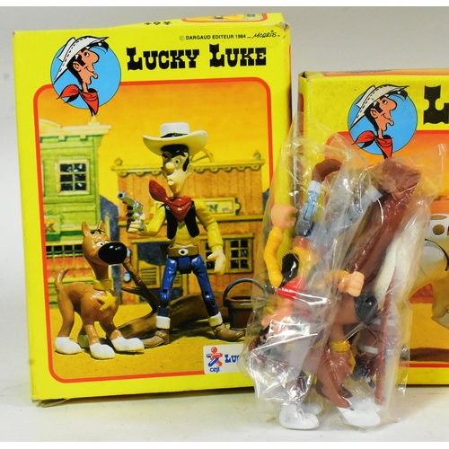 471 - Lucky Luke - a collection of x4 vintage 1980s (1984) French made Lucky Luke boxed action figure toys... 