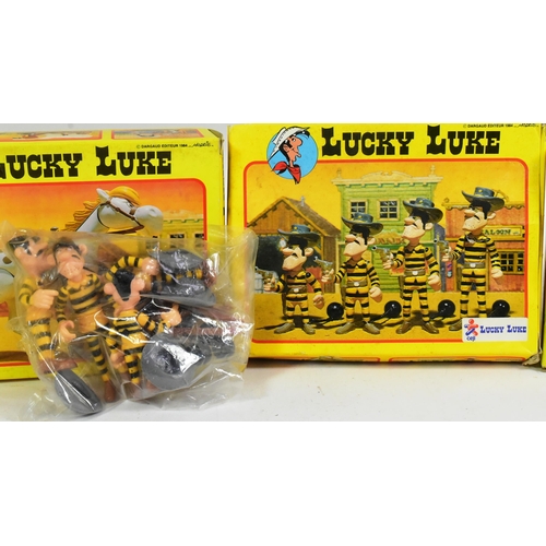 471 - Lucky Luke - a collection of x4 vintage 1980s (1984) French made Lucky Luke boxed action figure toys... 