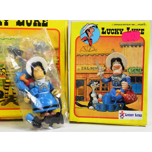 471 - Lucky Luke - a collection of x4 vintage 1980s (1984) French made Lucky Luke boxed action figure toys... 