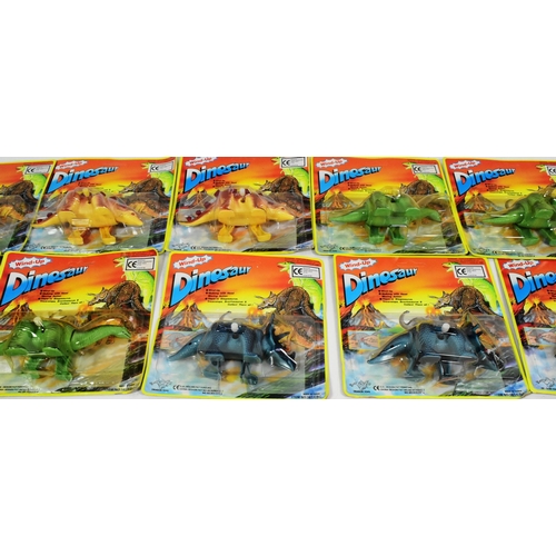 509 - A collection of vintage childrens rack pack toys and sticks comprising x12 Dragon Toys windup dinosa... 