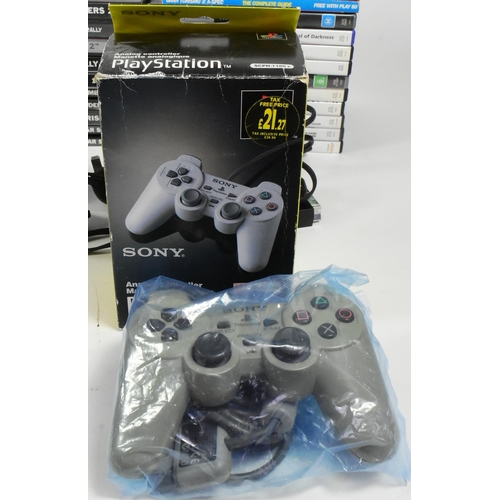 526 - Retro Gaming - an original Sony PS2 Playstation 2 video game console together with controllers and P... 