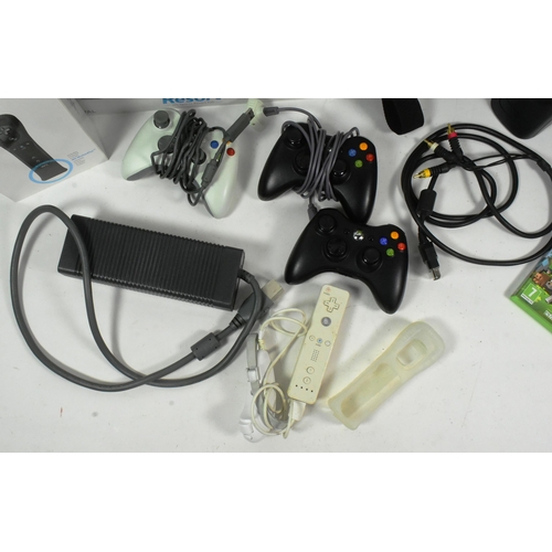 529 - Gaming - an Xbox 360 in black, along with a selection of Xbox controllers, along with a boxed Ninten... 