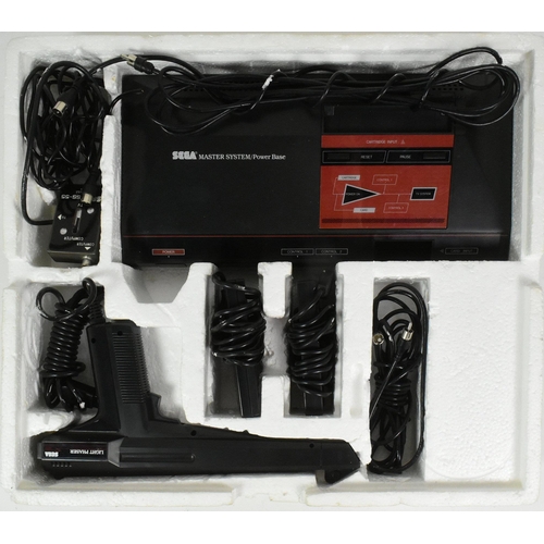 536 - Retro Gaming - an original vintage Sega Master System Plus games console, within its original box, a... 