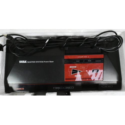 536 - Retro Gaming - an original vintage Sega Master System Plus games console, within its original box, a... 