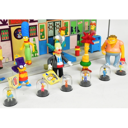 542 - The Simpsons - Playmates - a Simpsons 'Main Street' interactive playset, featuring the main street a... 