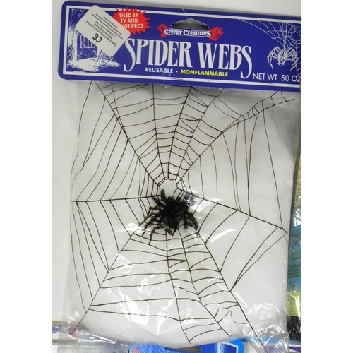 561 - A collection of vintage 1980s Halloween fancy dress costume ' rack pack ' items to include Spiders W... 