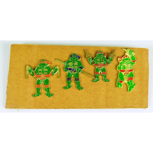 589 - Ninja Turtles - a collection of vintage TMNT Teenage Mutant Ninja Turtles French issued toy memorabi... 