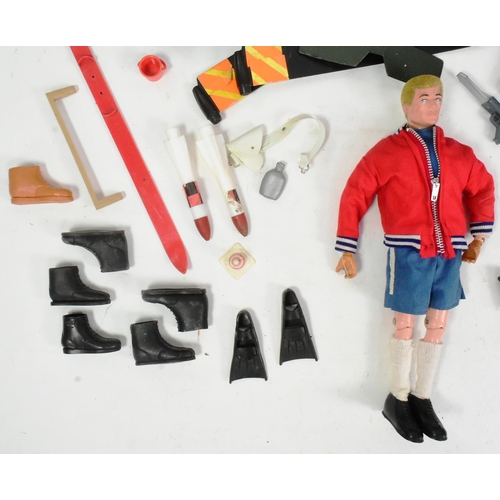 597 - Action Man - a vintage 1970s Palitoy Action Man footballer with additional Helicopter uniform, Assau... 