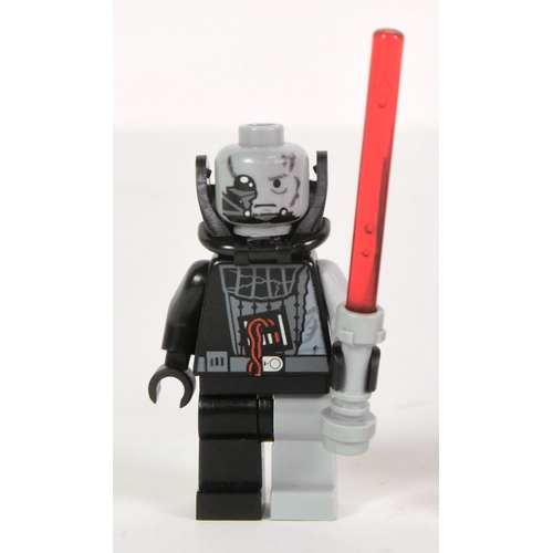 602 - Lego - x2 original Lego Star Wars minifigures comprising; Darth Vader Battle Damaged and Darth Maul.