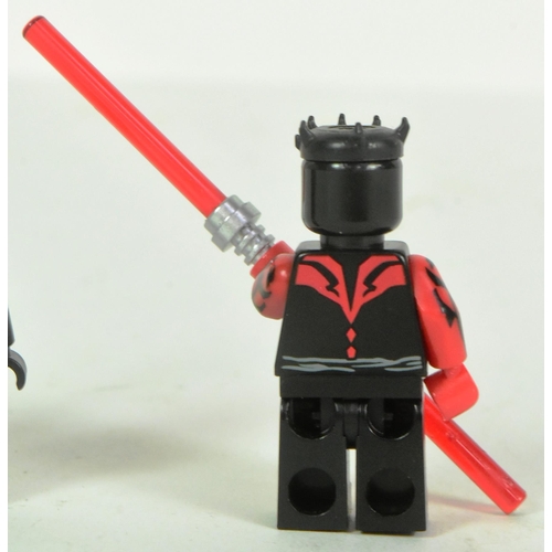 602 - Lego - x2 original Lego Star Wars minifigures comprising; Darth Vader Battle Damaged and Darth Maul.